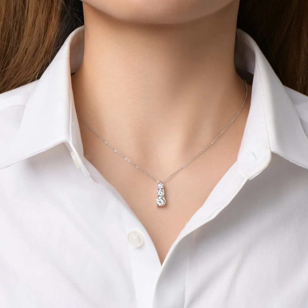 Dazzling Elegance: Lexie Vibrant Round Cut Moissanite Diamonds in a Water Drop Pendant Necklace - Crafted in 925 Sterling Silver.