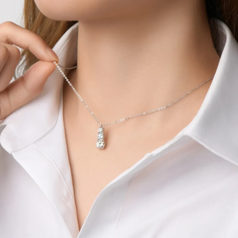 Dazzling Elegance: Lexie Vibrant Round Cut Moissanite Diamonds in a Water Drop Pendant Necklace - Crafted in 925 Sterling Silver.