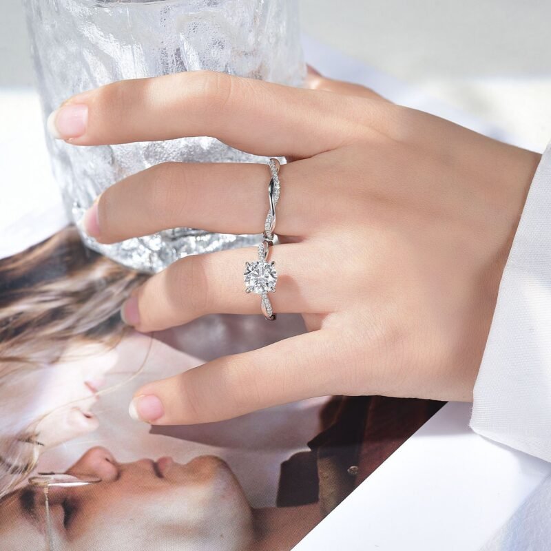 Elevate your style with this timeless four-claw vine Ellie moissanite ring featuring a dazzling 8.0mm, 2-carat stone. It is a perfect blend of classic elegance and modern allure.