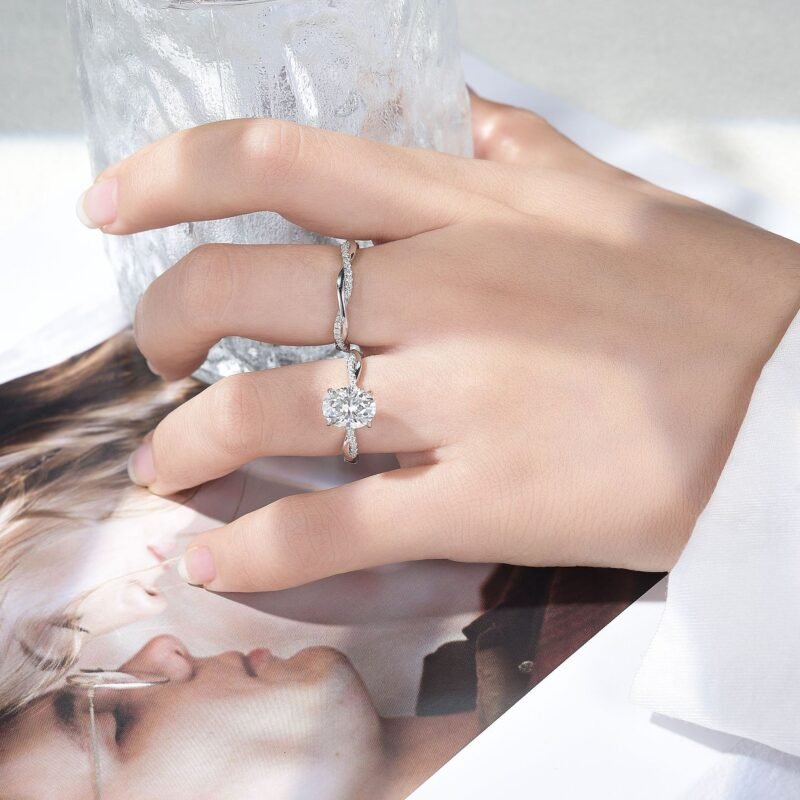 Indulge in luxury with our breathtaking Aria Oval Moissanite Ring. Crafted from premium S925 Sterling Silver, this stunning piece features a dazzling 2-carat oval-cut moissanite stone,