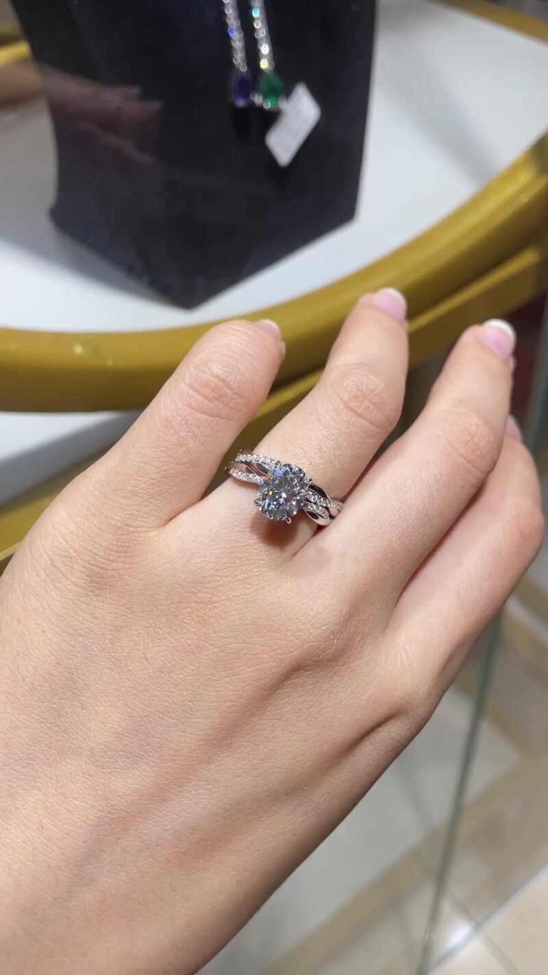 Indulge in luxury with our breathtaking Aria Oval Moissanite Ring. Crafted from premium S925 Sterling Silver, this stunning piece features a dazzling 2-carat oval-cut moissanite stone,