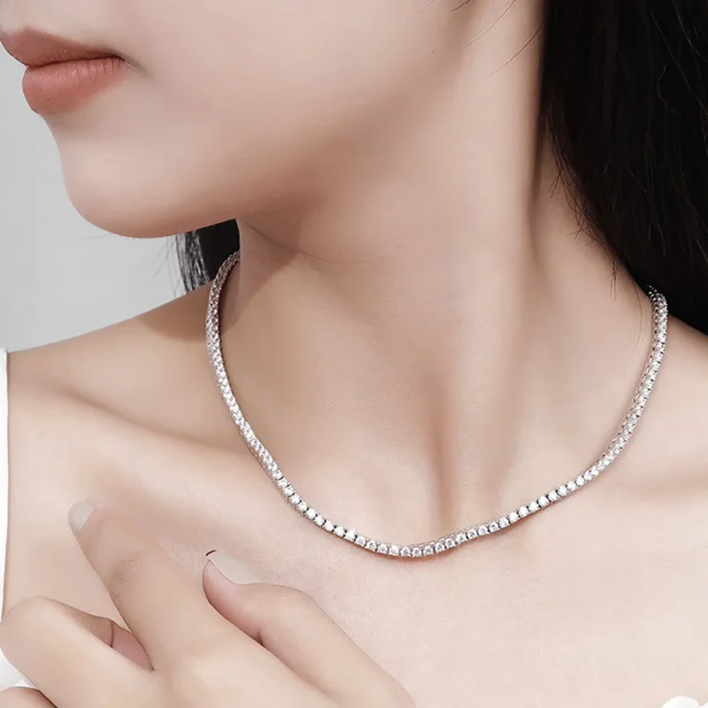 Luxurious Luxury: Delilah Moissanite Tennis Necklace - Indulge in the ultimate luxury with this exquisite moissanite tennis necklace. Featuring D color stones and a timeless design.