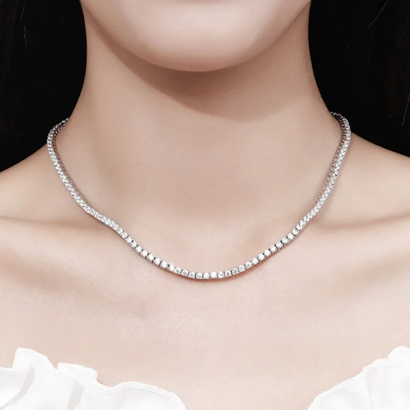 Luxurious Luxury: Delilah Moissanite Tennis Necklace - Indulge in the ultimate luxury with this exquisite moissanite tennis necklace. Featuring D color stones and a timeless design.