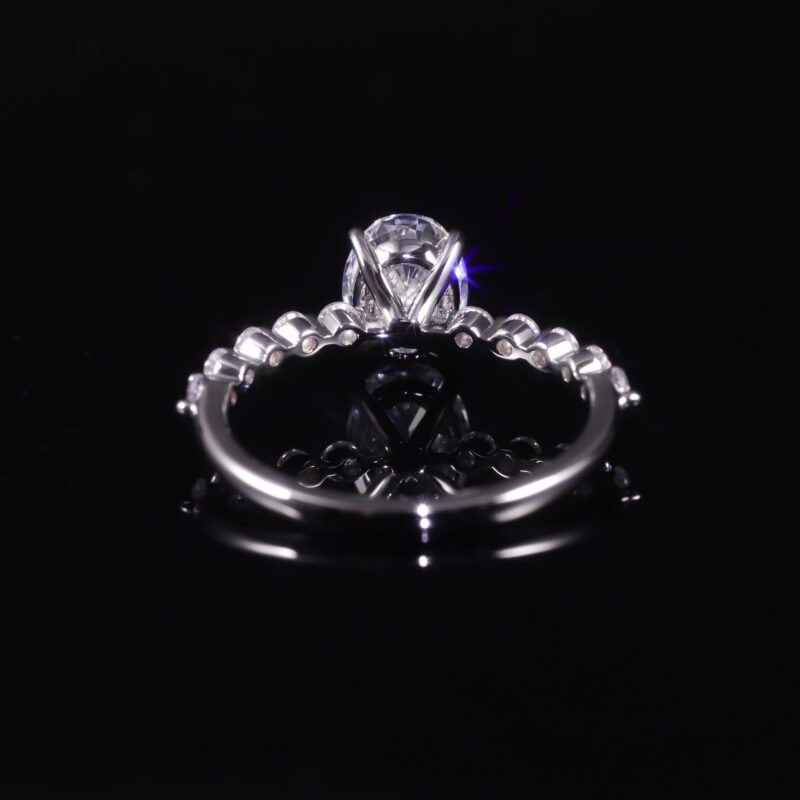 Elegant sterling silver Ivy Moissanite Ring with a 1.5 ct oval moissanite centerpiece.