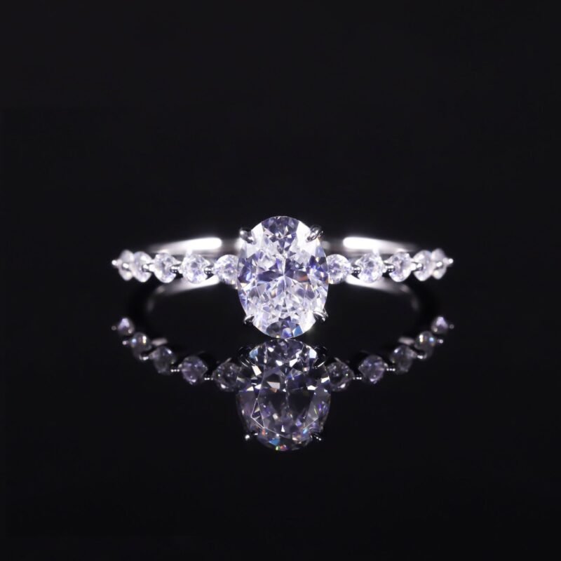 Elegant sterling silver Ivy Moissanite Ring with a 1.5 ct oval moissanite centerpiece.